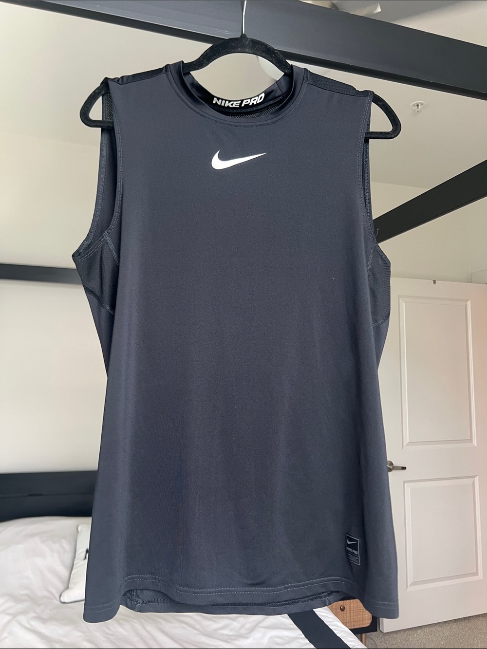 Nike Black Sleeveless Performance Tank with White Swoosh